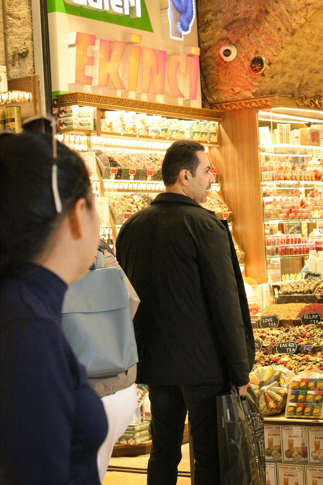 store detective observing customer