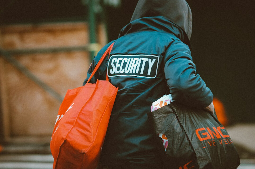 store detective watching security cameras