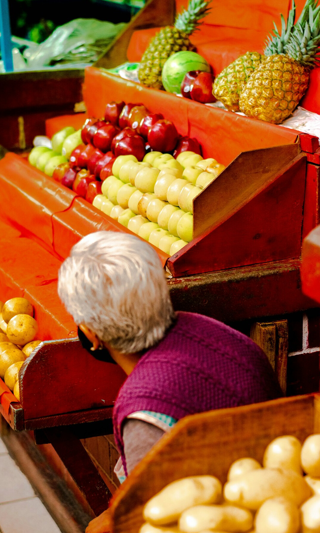 elderly woman shopping in store
